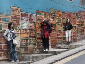 Graham Road street art with people posing