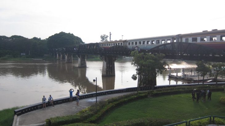 train crossing river kwai bridge kanchanaburi